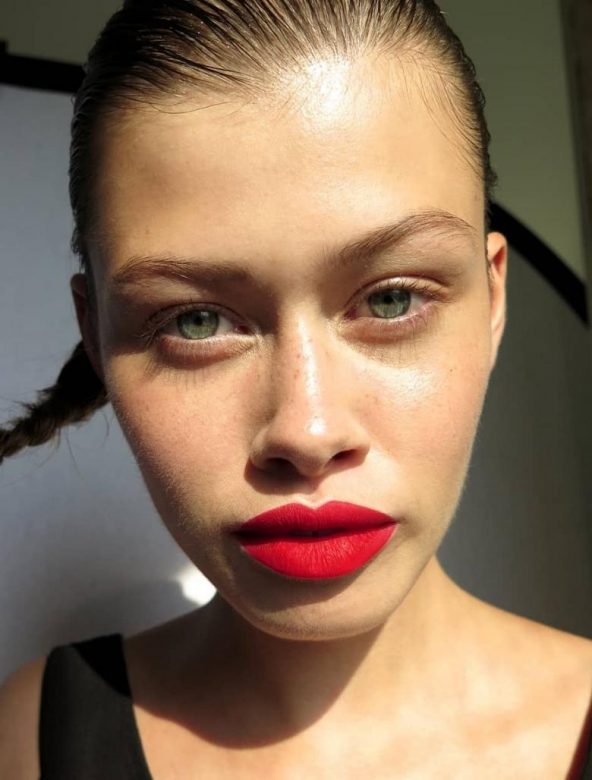 Red lipstick paired with skincare