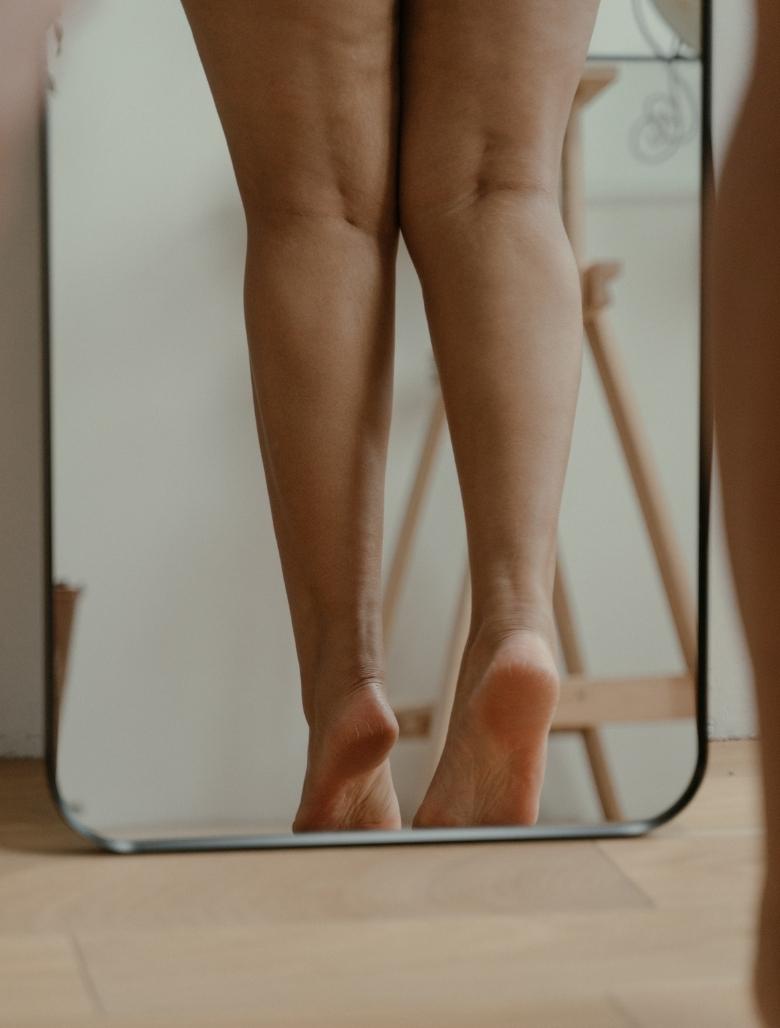 legs in a mirror